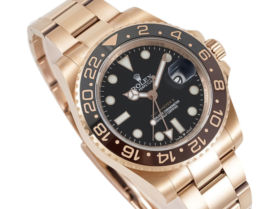 GMT-Master II Rose Gold 'Root Beer' (40mm) watch with a black dial, two-tone bezel, oyster bracelet displayed at an angle.