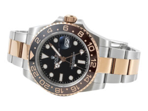 GMT-Master II Two Tone Rose Gold and Stainless Steel 'Root Beer' (40mm) with black dial, rotatable bezel, and date display.