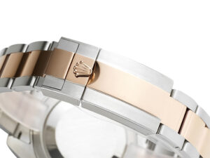 Close-up of the clasp detail on the GMT-Master II Two Tone Rose Gold and Stainless Steel ‘Root Beer’ (40mm) watch bracelet.