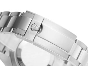 Close-up of the clasp on the GMT-Master II Stainless Steel ‘Batman’ (40mm), featuring apolished finish and iconic crown logo.