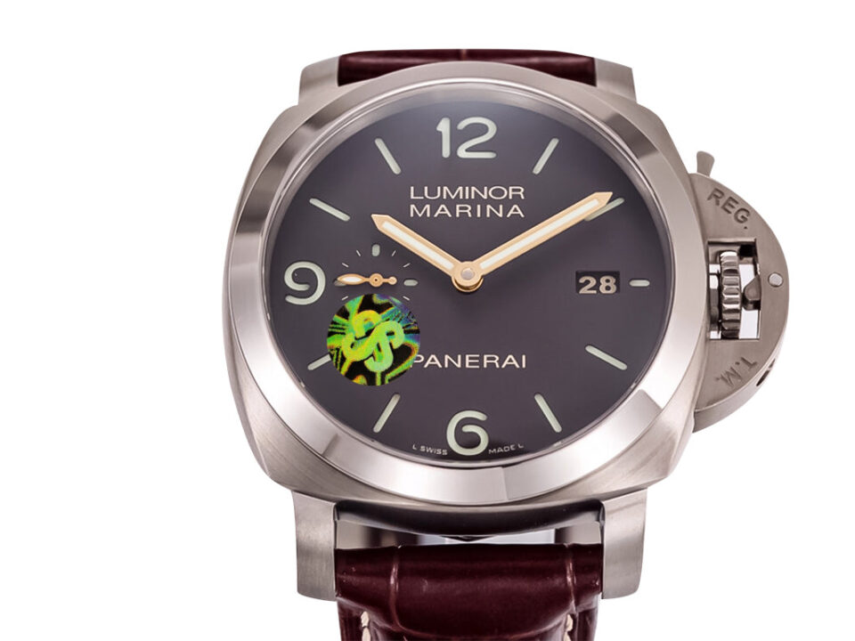 Luminor 1950 Marina 3 Days Automatic Titanium watch with brown dial, date display, and matching brown leather strap (44mm).
