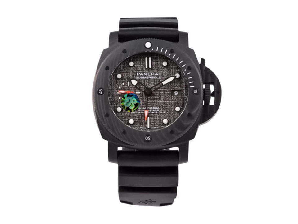 Luminor Submersible 47 Luna Rossa wristwatch with grey forged carbon case, black bezel, and textured dial displayed upright.
