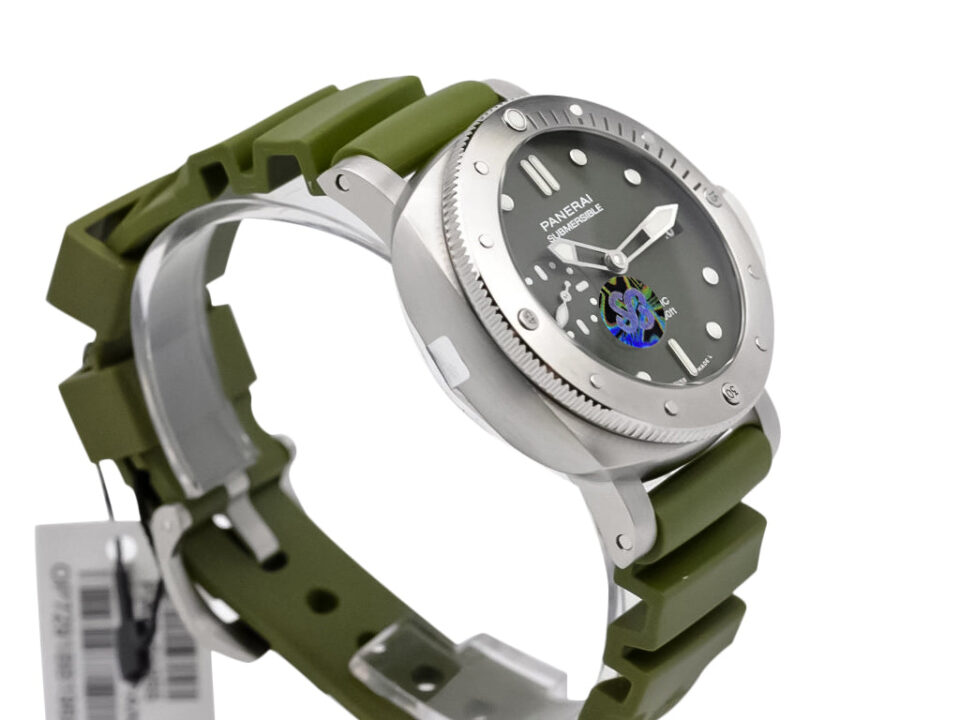 Luminor Submersible 42 watch with brushed stainless steel case, verde militare dial, and green rubber strap.