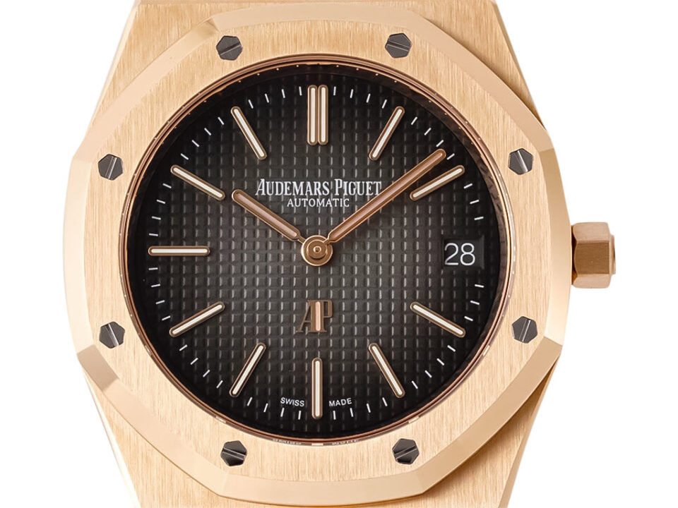 Royal Oak ‘Jumbo Extra-Thin’ Pink Gold ’50th Anniversary’ watch with grey dial, octagonal bezel, and gold hour markers.