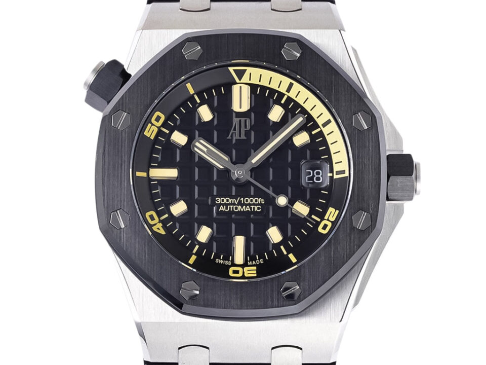 Royal Oak Offshore Diver 42mm watch in stainless steel with a black dial, yellow accents, and unidirectional rotating bezel.