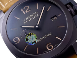 Close-up of Luminor 1950 Marina 3 Days Automatic with black dial, brown strap, silver hands, and a date display at 3 o'clock.