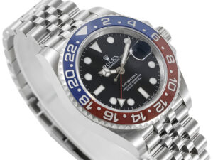 GMT-Master II Stainless Steel ‘Pepsi’ on Jubilee (40mm) with red and blue bezel, black dial, and date display.