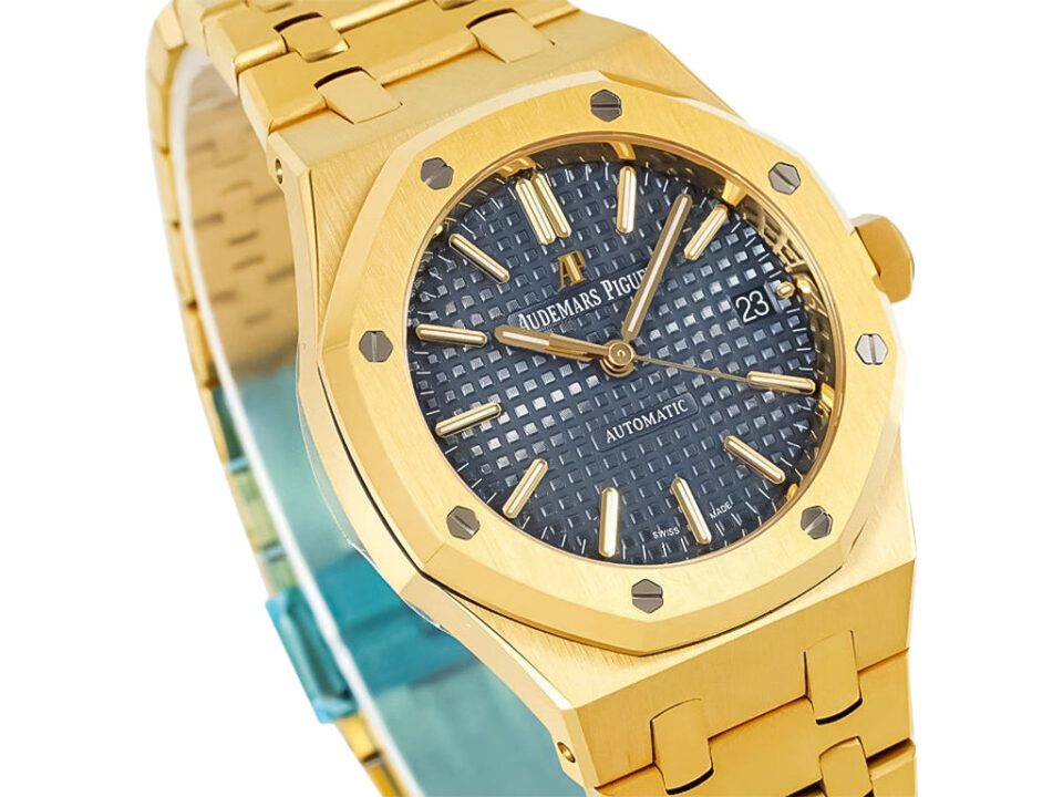 Royal Oak Yellow Gold watch with 37mm case, blue patterned dial, gold hour markers, and integrated bracelet.