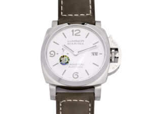 Luminor 1950 44mm watch with brushed stainless steel case, polished bezel, white dial, and brown leather strap.