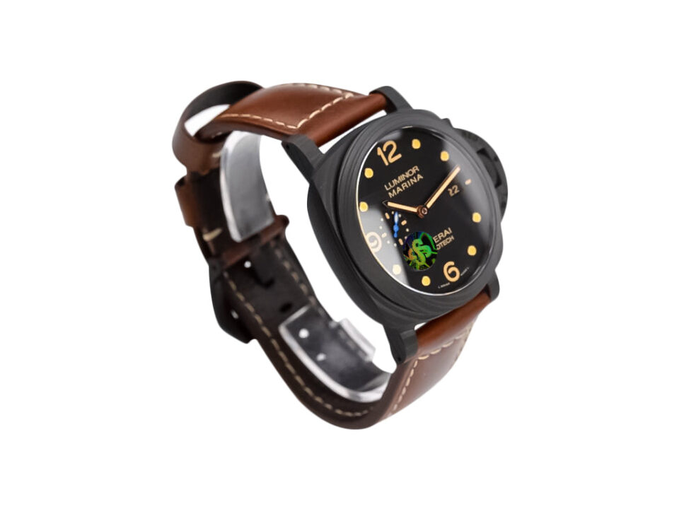 Luminor 1950 44 3 Days Automatic watch with a titanium and carbon case, black dial, and brown leather strap.