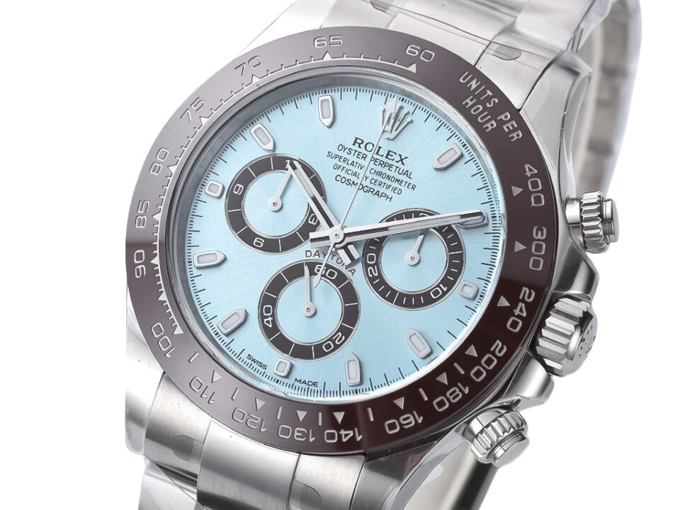 Cosmograph Daytona Platinum watch with an ice blue dial, black ceramic bezel, and stainless steel bracelet displayed.
