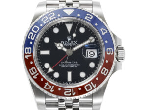 GMT-Master II Stainless Steel 'Pepsi' on Jubilee with red and blue bezel, black dial, date display, Oyster Perpetual design.