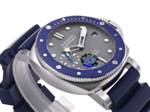 Luminor Submersible 42, stainless steel case with shark-grey dial and blue bezel, showcased on a navy rubber strap.