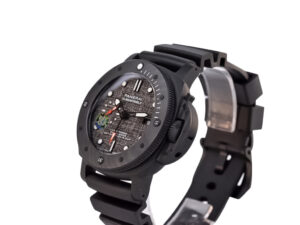 Luminor Submersible 47 Luna Rossa watch with Carbotech forged carbon case, grey carbon bezel, and black rubber strap.