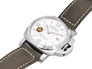 Luminor 1950 44 3 Days Automatic with brushed stainless steel case, polished bezel, white dial, and brown leather strap.