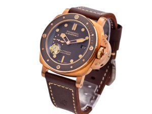 Luminor Submersible 3 Days Automatic watch with bronze case, titanium caseback, brown dial, and leather strap.