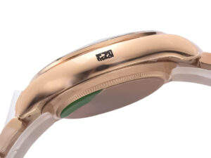 Side view of Cosmograph Daytona Rose Gold with Diamond Pink Dial, showcasing its polished rose gold case and sleek design.