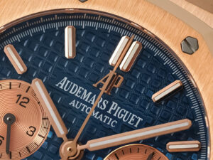 Close-up of the Royal Oak Chronograph Pink Gold Blue Dial (41mm), showcasing intricate detailing elegant rose gold accents.