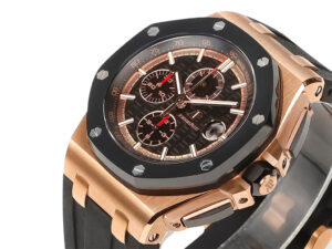 Royal Oak Offshore Chronograph in 44mm pink gold case, black dial with subdials, and black strap displayed at an angle.