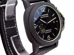 Luminor 1950 44 3 Days Automatic 'Carbotech' watch with a forged carbon case, black sunburst dial, and luminous markers.