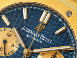 Close-up view of the Royal Oak Chronograph Yellow Gold with Blue Dial (41mm), showcasing its textured face and gold accents.