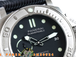 Close-up of the Luminor Submersible 47 'Mike Horn Edition' watch showing titanium case, bezel, and black dial with markers.