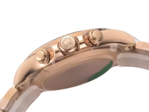 Side view of the Cosmograph Daytona Rose Gold watch showcasing its polished rose gold finish and intricate crown details.