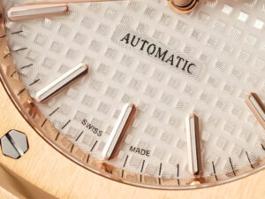 Close-up of the Royal Oak Pink Gold 37mm watch with a silver guilloché dial, rose gold hour markers, and "Automatic" text.