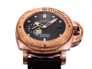 Luminor Submersible 1950 watch with a green dial, titanium and bronze case, and brown strap displayed at an angle.