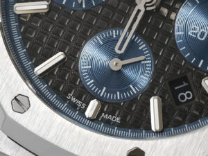 Close-up of the Royal Oak Chronograph Stainless Steel with Titanium Dial, showcasing details and "Swiss Made" marking.