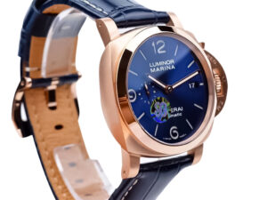 Luminor 1950 44 3 Days Automatic Goldtech Cushion Case with ‘Sole Blu’ Sunburst Dial, blue leather strap, and date display.