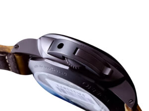 Side view of the Luminor 1950 Marina 3 Days Automatic Aluminium watch, showcasing its black case and brown leather strap.