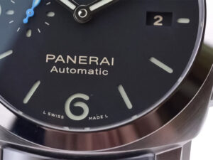 Close-up of the Luminor 1950 44 3 Days Automatic watch with a black dial, polished bezel, and brushed stainless steel case.