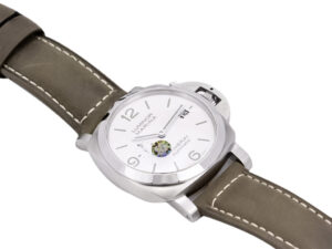 Luminor 1950 44mm watch with brushed stainless steel case, polished bezel, white dial, and brown leather strap.
