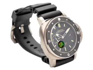 Luminor Submersible 1950 Amagnetic 3 Days Automatic 'Titanio' watch with black dial, luminous markers, & black rubber strap.