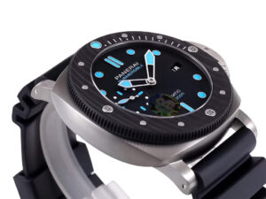 Luminor Submersible 47mm watch with BMG-Tech titanium case, forged carbon bezel, black rubber strap, and blue accents.