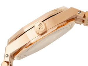 Side view of the Royal Oak Pink Gold watch with a silver dial, showcasing the 37mm case and signature hexagonal crown design.