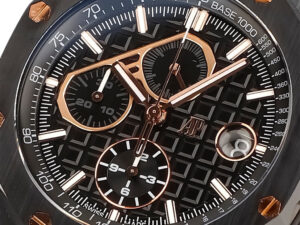 Close-up of the Royal Oak Offshore Chronograph Gims Ceramic watch with a black dial, rose gold accents, and 44mm case.