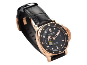 Luminor Submersible 42 3 Days Automatic watch with Goldtech red gold case, black dial, and black leather strap.
