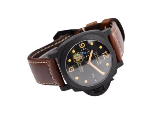 A Luminor 1950 44 3 Days Automatic watch with a carbotech titanium and carbon case, black dial, and brown leather strap.