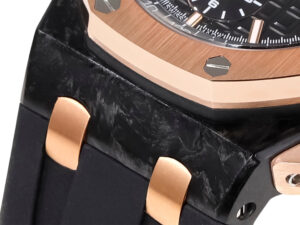 Close-up of the Royal Oak Offshore Chronograph in ceramic and pink gold with a black dial, featuring a textured strap.