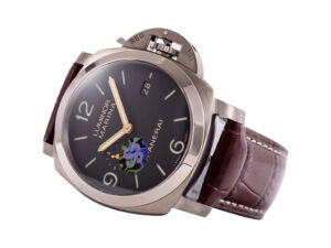 Luminor 1950 Marina 3 Days Automatic Titanium watch with a brown dial and matching brown leather strap, angled view.