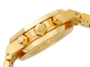 Side profile of the Royal Oak Chronograph Yellow Gold watch with a detailed view of its crown and pushers on the case.