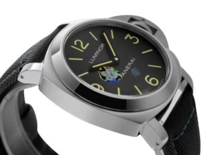 Alt text: Luminor Base 44 Logo 3 Days Acciaio ‘Blue OP’ stainless steel watch with black dial and green-accented strap.