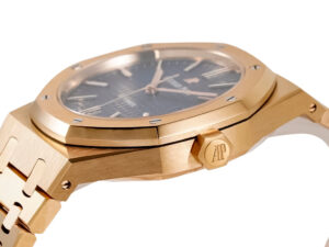 Royal Oak Pink Gold watch with blue dial (41mm) shown close-up, highlighting its octagonal bezel and elegant craftsmanship.