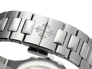 Close-up of the Nautilus Stainless Steel bracelet clasp, showcasing polished links and the engraved emblem on the 41mm model.