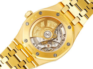 Back view of the Royal Oak Yellow Gold with Blue Dial (37mm), showcasing its intricate automatic movement and gold bracelet.
