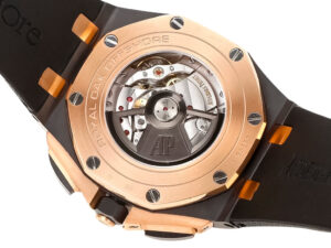 Back view of the Royal Oak Offshore Chronograph in ceramic and pink gold, showcasing its open caseback and detailed movement.