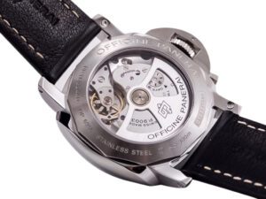 Close-up of the back of the Luminor 1950 3 Days GMT 24h Automatic featuring a stainless steel case and visible mechanism.