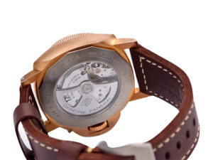 Back view of Luminor Submersible 3 Days Automatic ‘Bronzo’ watch showcasing bronze case, titanium caseback, and brown strap.